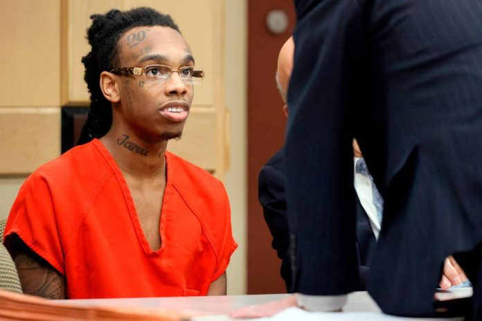 image showing ynw melly sitting in court