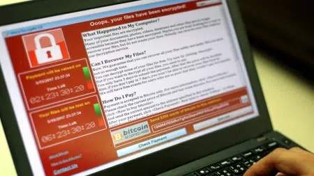 A man installing cracked software